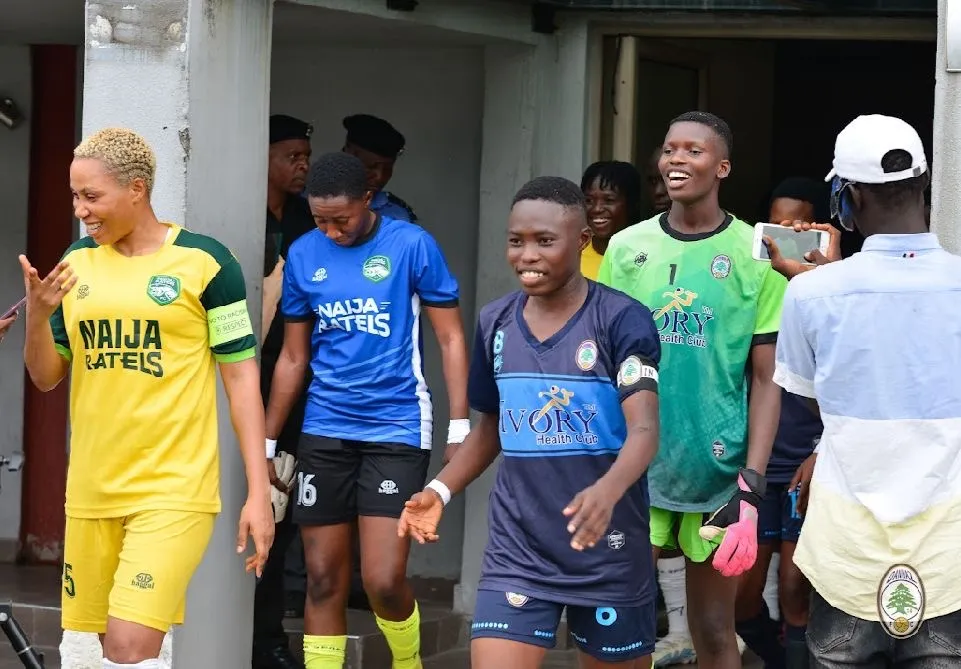 Onome Ebi (left) and Fatimoh Solaty (right) leading their team out for the NWFL matchday two game between Naija Ratels and Dannaz Ladies (©️ Dannaz Media)