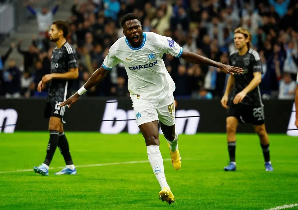 Photo: Chancel Mbemba celebrates scoring for Olympique Marseille against Ajax in Europa League at the Orange Velodrome. Credit Reuters/Sarah Meyssonnier