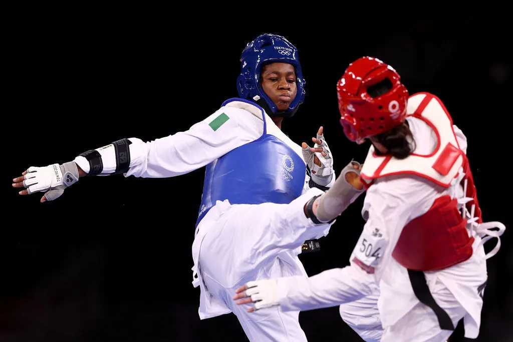 Photo: Nigeria's Elizabeth Anyanacho, left, lost in the first round against Nur Tatar of Turkey at Tokyo 2020 (Credit: Getty Images)