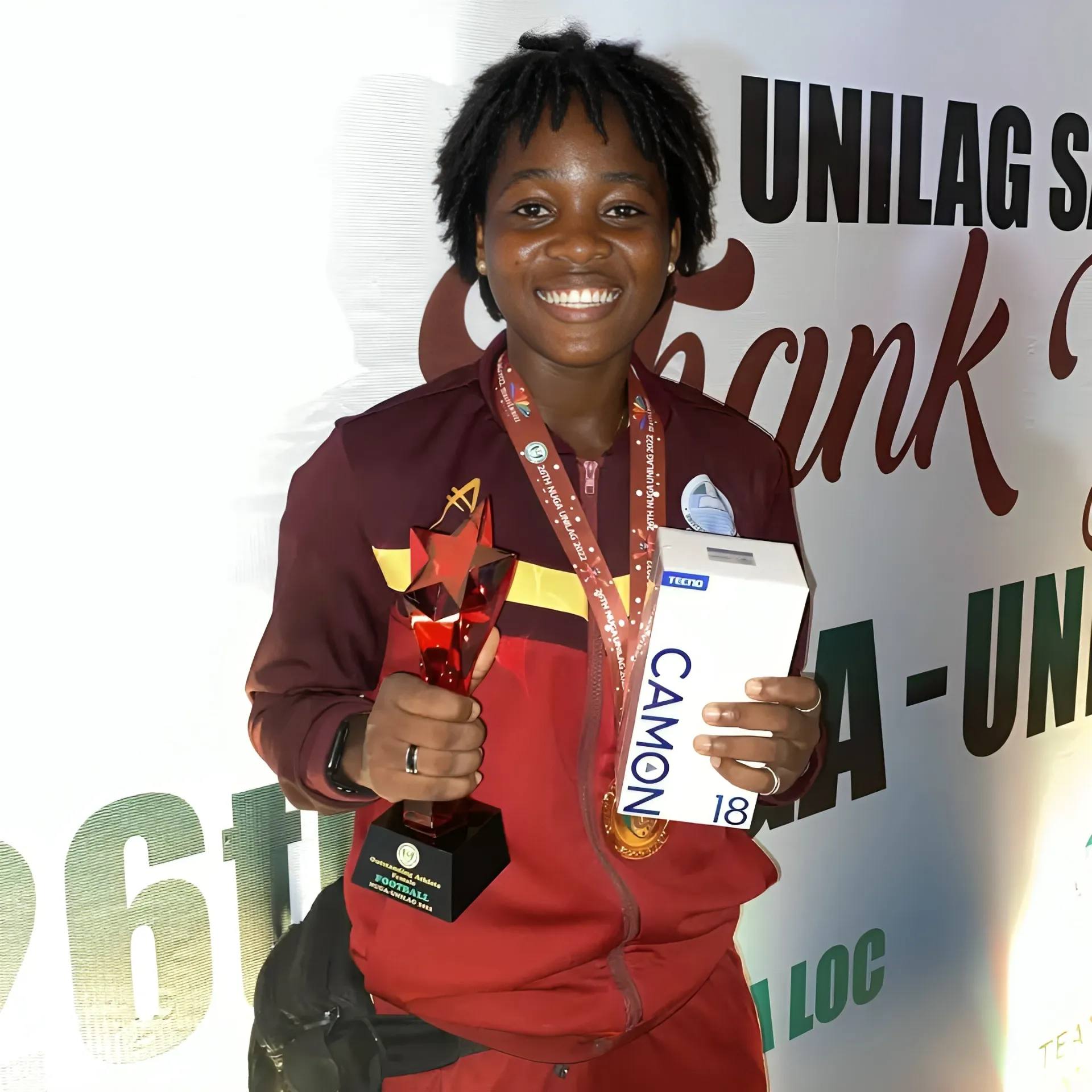 Olasubomi Ogundele: The Student-Athlete Sewing Soles, Scoring Goals And Chasing Roles 5 Photo: Olasubomi Ogundele With Her Gold Medal, Most Valuable Player Award, And Top Scorer Prize Won At The 2022 Nigeria University Games. (Credit: Subbyrankin/Instagram)