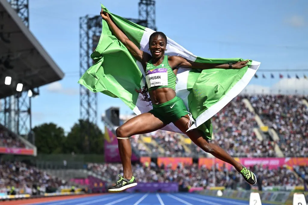 Nigeria'S Tobi Amusan Celebrates Winning And Taking The Gold Medal In The Women'S 100M Hurdles Final Athletics Event At The Alexander Stadium, In Birmingham On Day Ten Of The Commonwealth Games In Birmingham, Central England, On August 7, 2022. Photo Credit: Afp